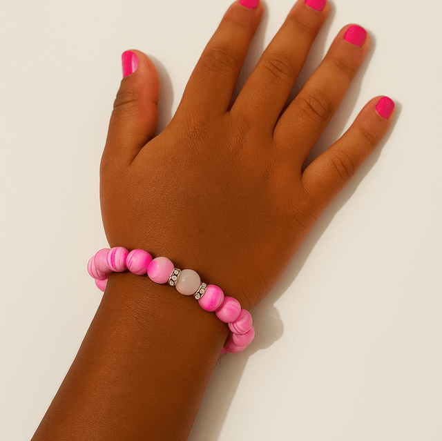 Cotton Candy Glow armband – elastische kinderarmband met roze gemarmerde kralen en glinsterende strass accenten