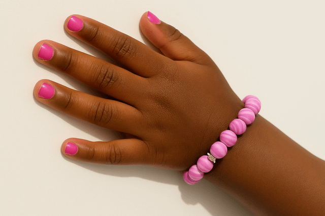 Cotton Candy Glow armband – elastische kinderarmband met roze gemarmerde kralen en glinsterende strass accenten