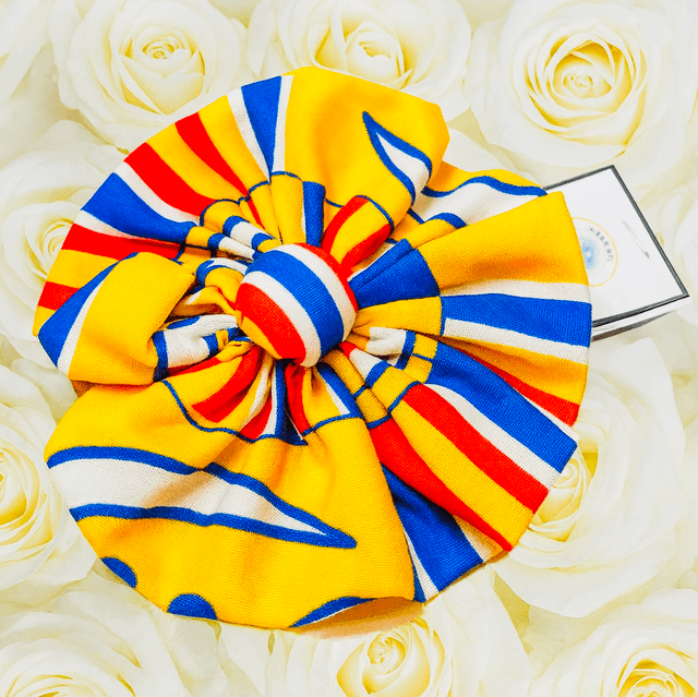 Kleurrijke Kente Haarbloem met Elastiek – Handgemaakte Afrikaanse Haaraccessoire van 100% Katoen