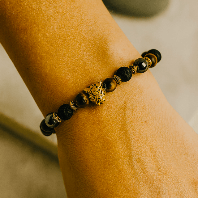 Golden Instinct – Armband met Tijgeroog & Luipaardkop
