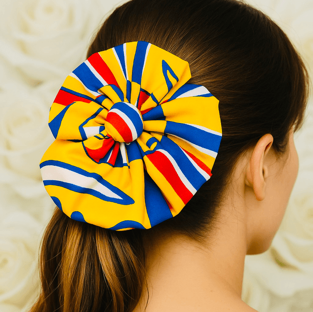 Kleurrijke Kente Haarbloem met Elastiek – Handgemaakte Afrikaanse Haaraccessoire van 100% Katoen